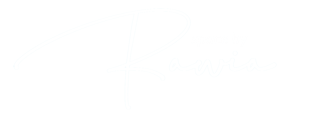 The image displays the elegant cursive logo of "space by rawia," possibly indicating a brand or personal venture characterized by a sophisticated and minimalist aesthetic.
